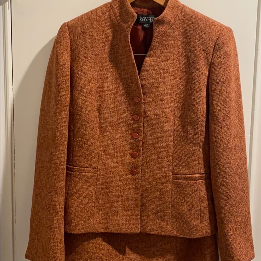 Woman’s suit, professional business suit.